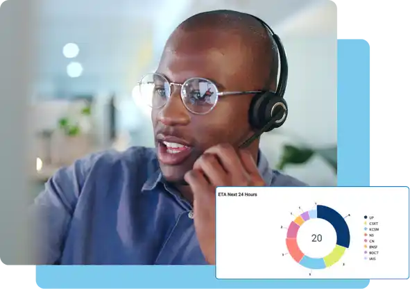 Customer service agent talking on headset in office